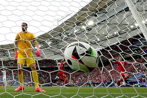 Christian Eriksen scores a goal against Slovenia